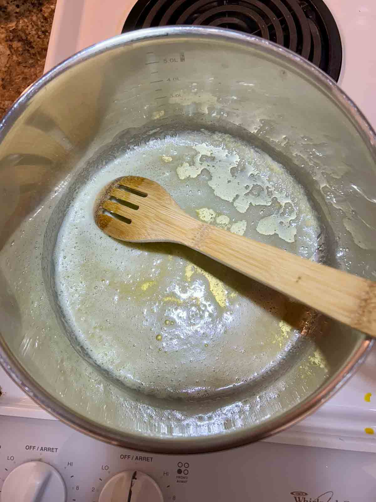 melted butter in pot.