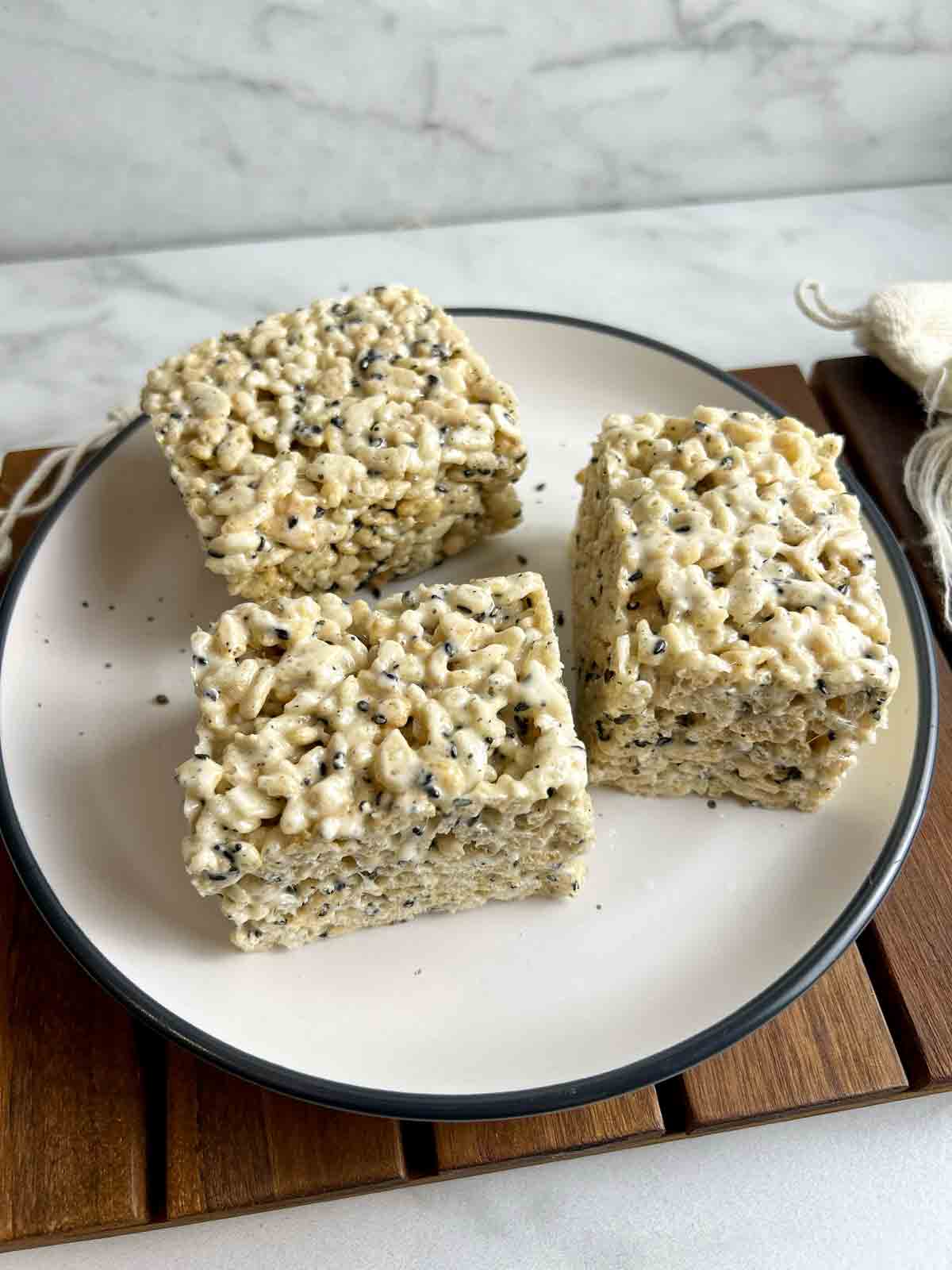 side view of Rice Krispies squares on plate.