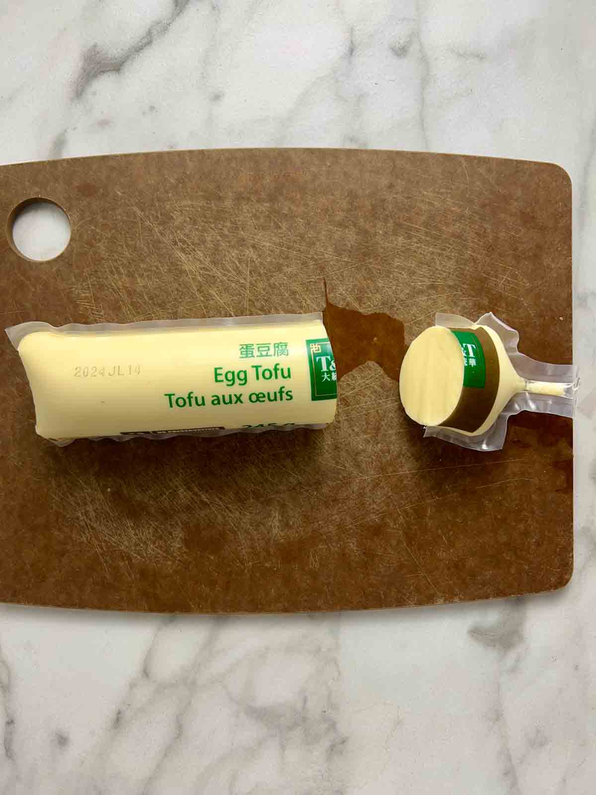 package of egg tofu cut through dotted line.