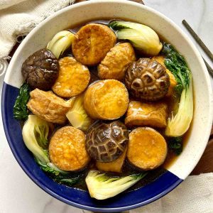 overhead shot of braised egg tofu in dish.