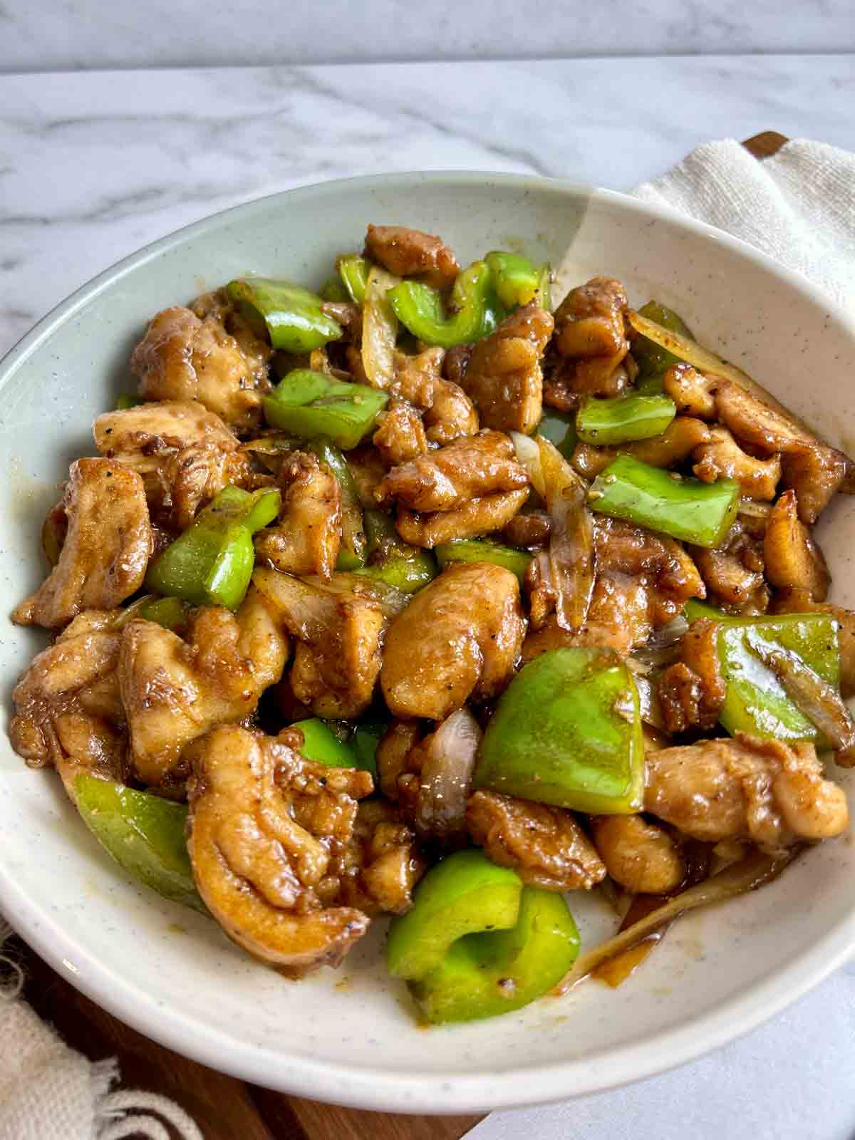 side shot of Chinese black pepper chicken.