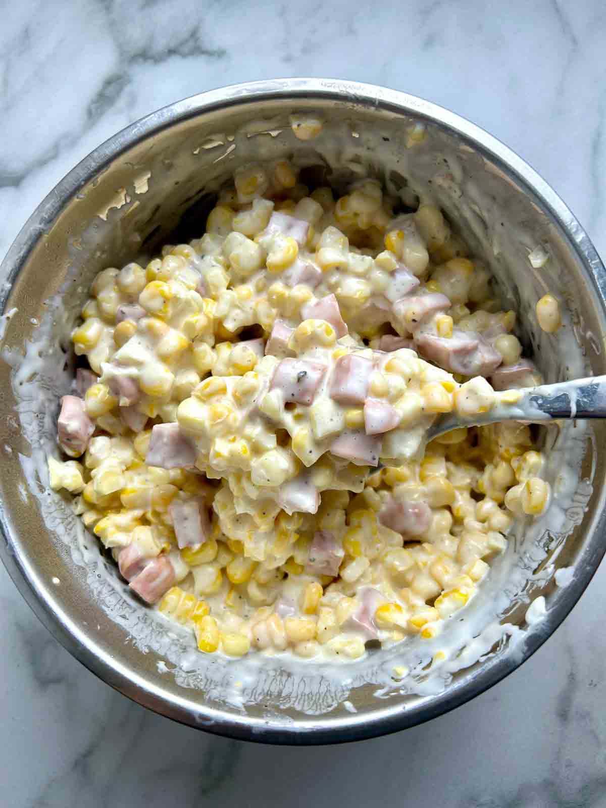 ham, corn, and mayo mixture in bowl.