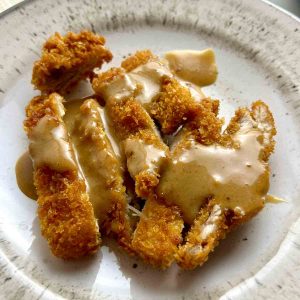 close up of Chinese peanut butter chicken.