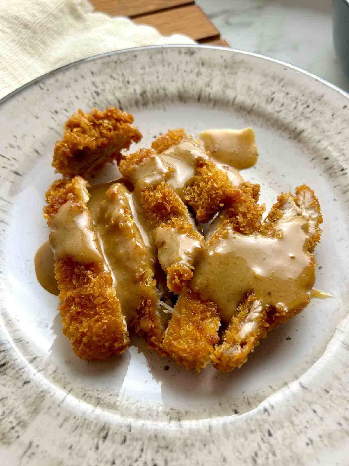 close up of Chinese peanut butter chicken.