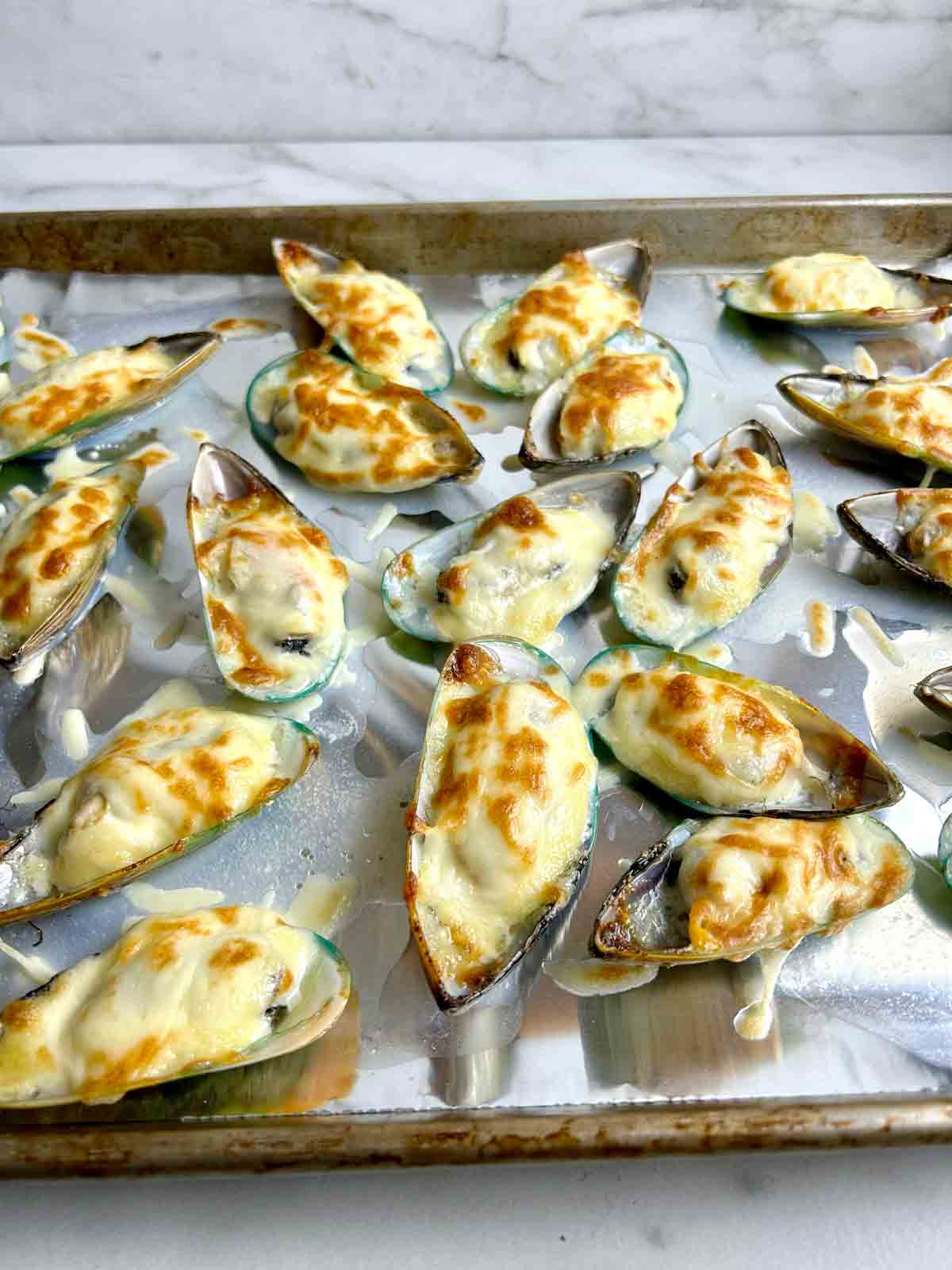 cheesy mayo mussels after baking for 10 minutes.