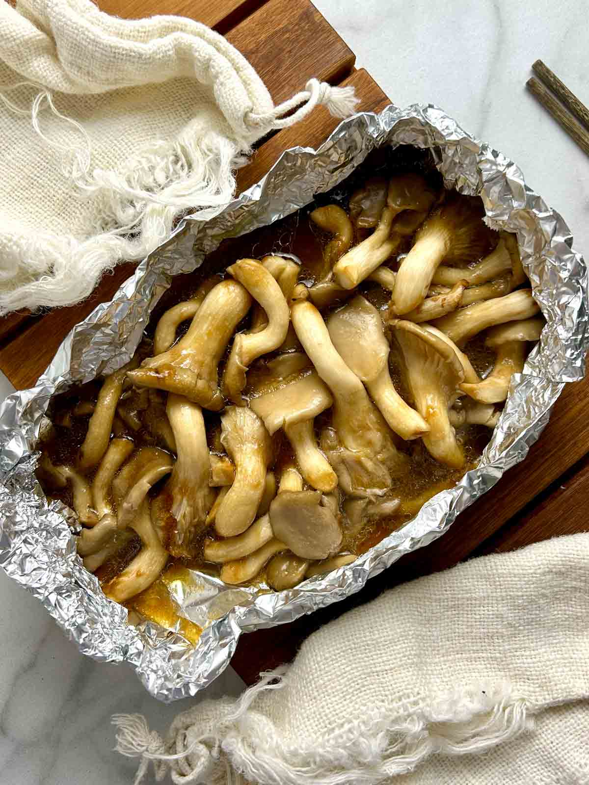 air-fried soy butter oyster mushrooms in tin foil pouch.