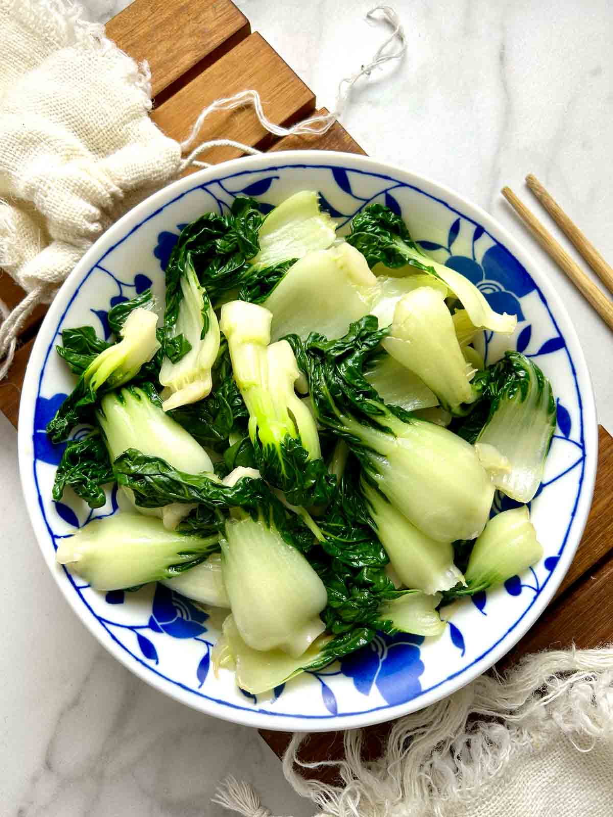 boiled bok choy on plate.