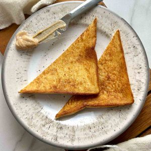 two slices of brown sugar toast on plate.