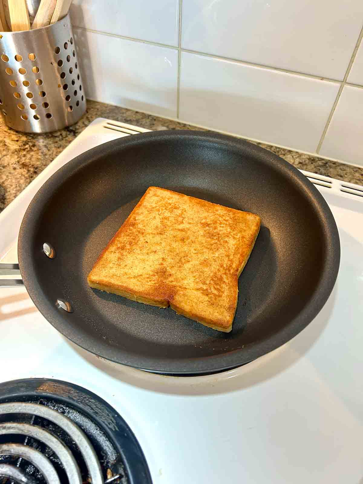 brown sugar toast being grilled on nonstick pan.