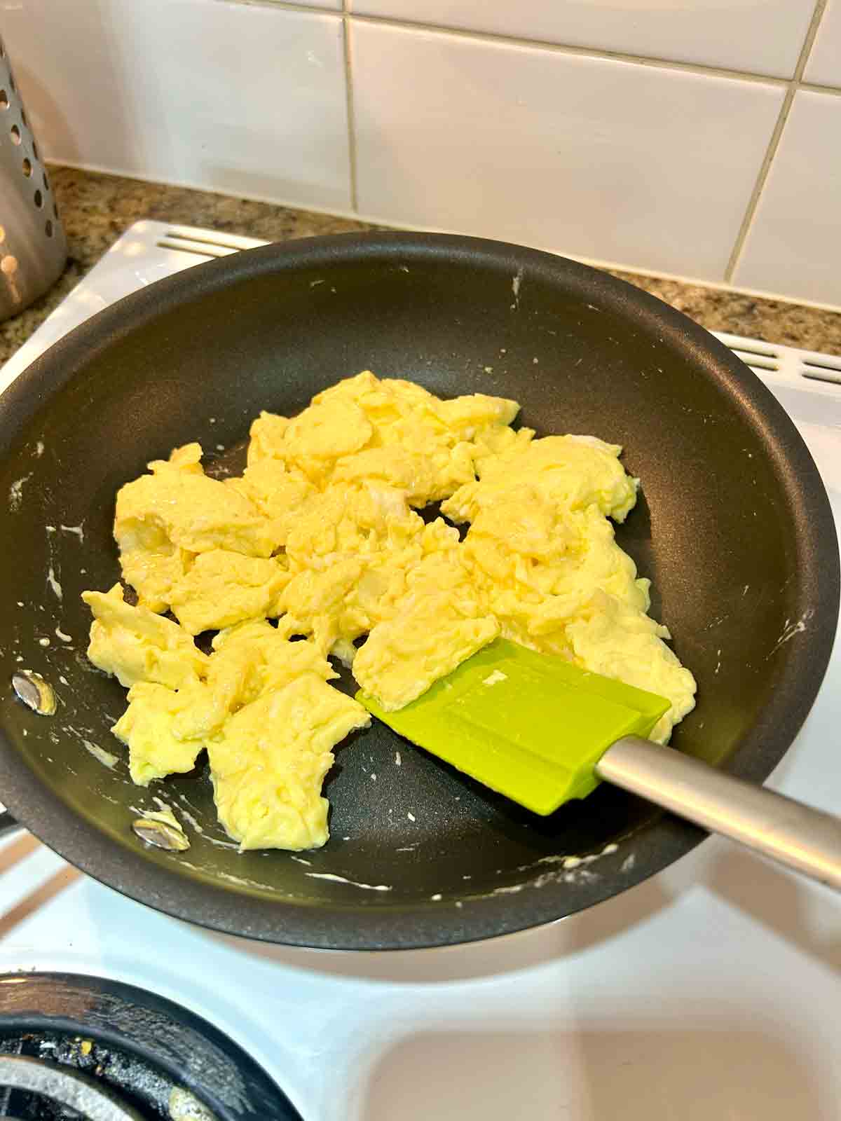 regular scrambled eggs in pan.