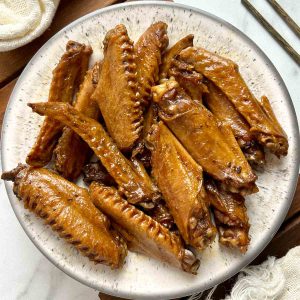 plate of braised duck wings.