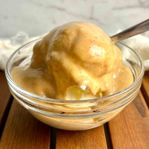 peanut butter sauce drizzled on top of ice cream.