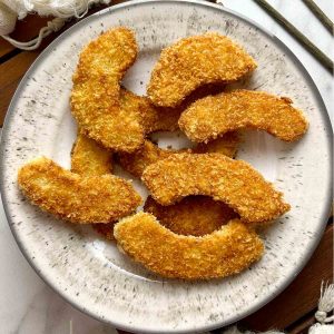 fried pumpkin slices on plate.