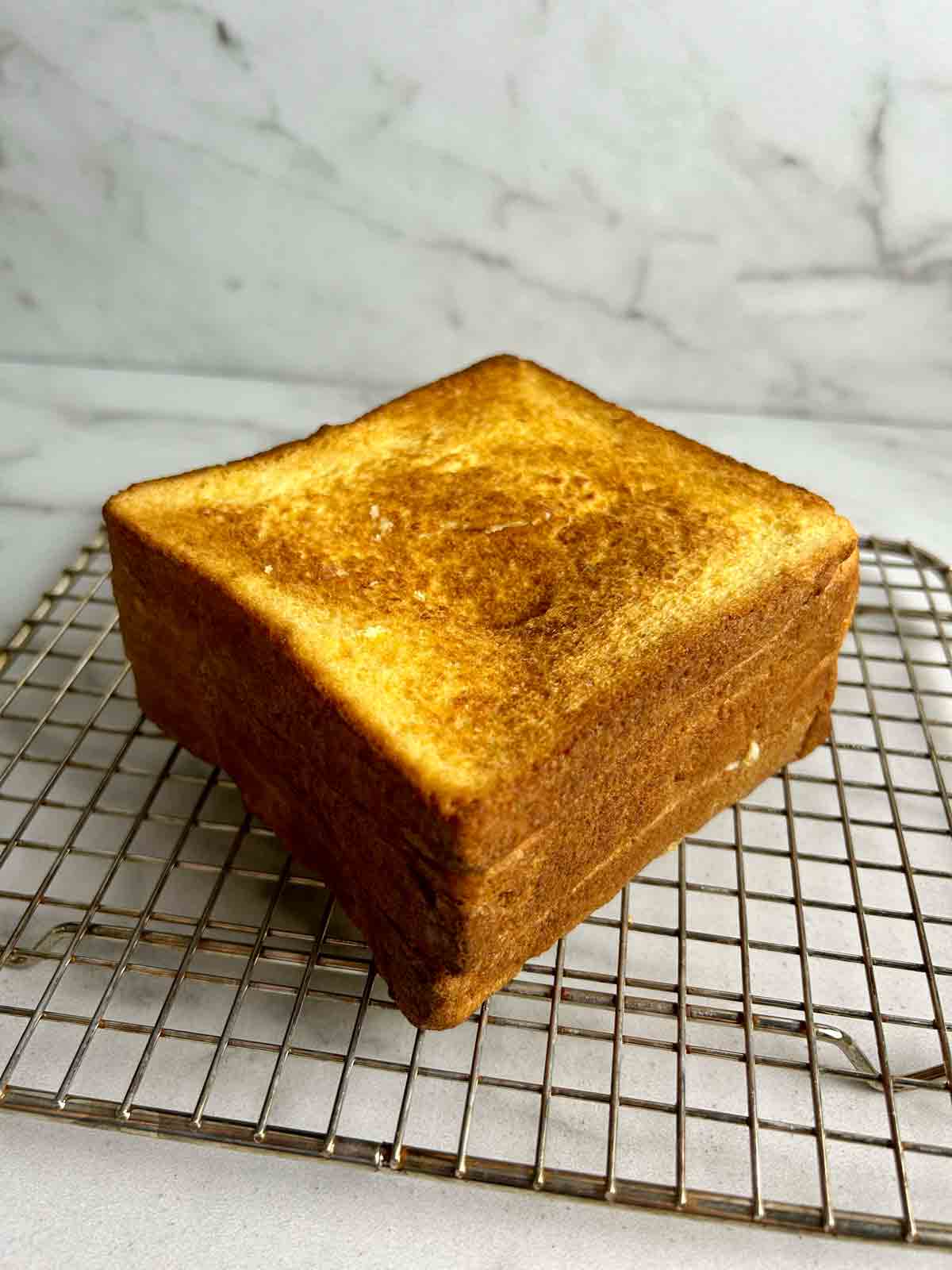 air fried version of French toast on wire rack.