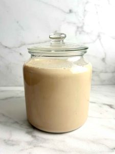 horchata coffee in large glass container.