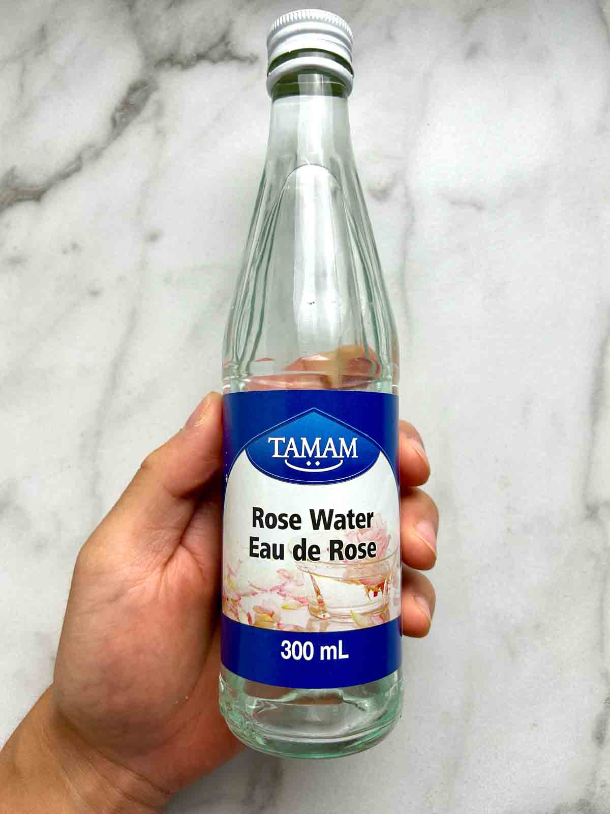 glass bottle of rose water.