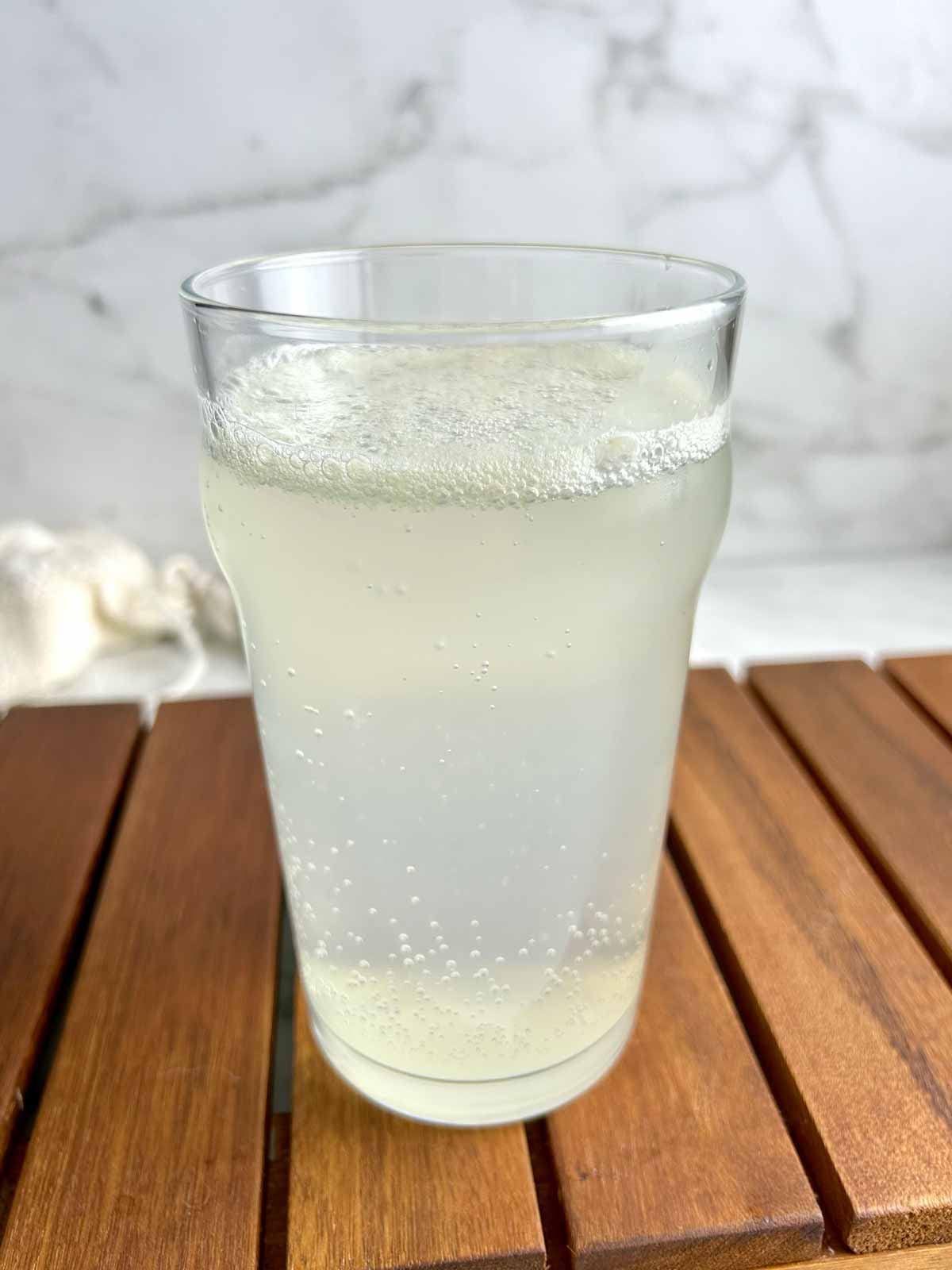 close up of rose water lemonade to show carbonation.