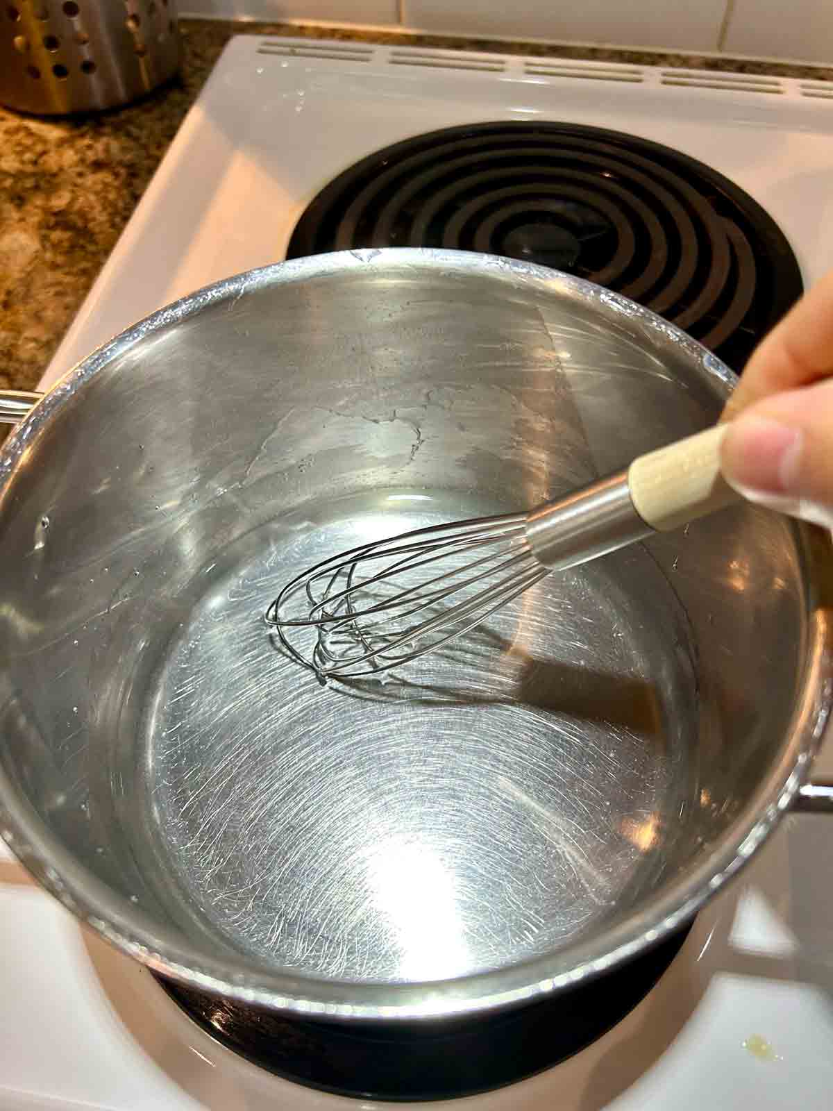 making simple syrup in saucepan.