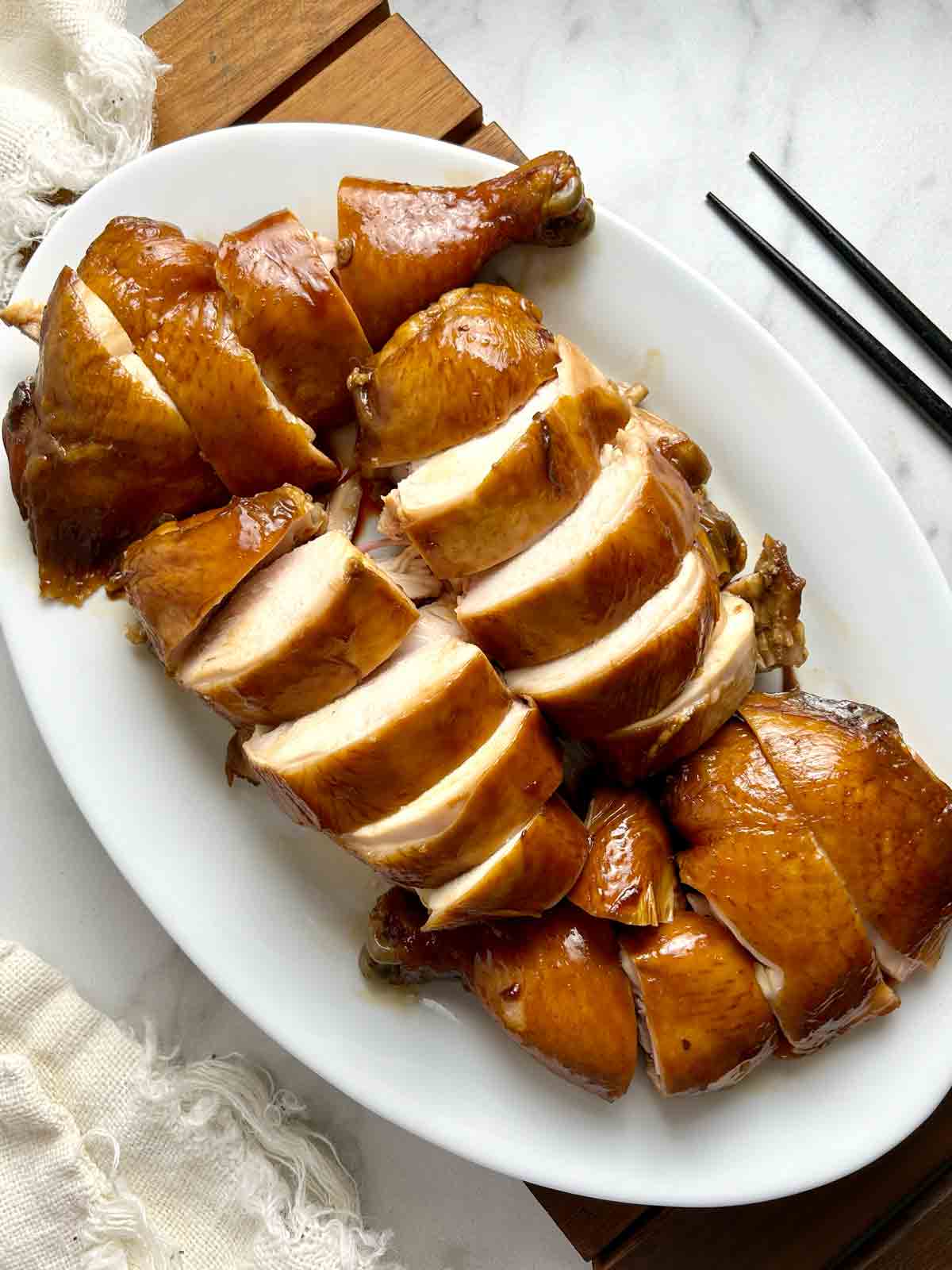 sous vide soy sauce chicken sliced and plated.