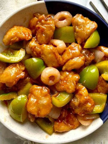 sweet and sour chicken on plate.