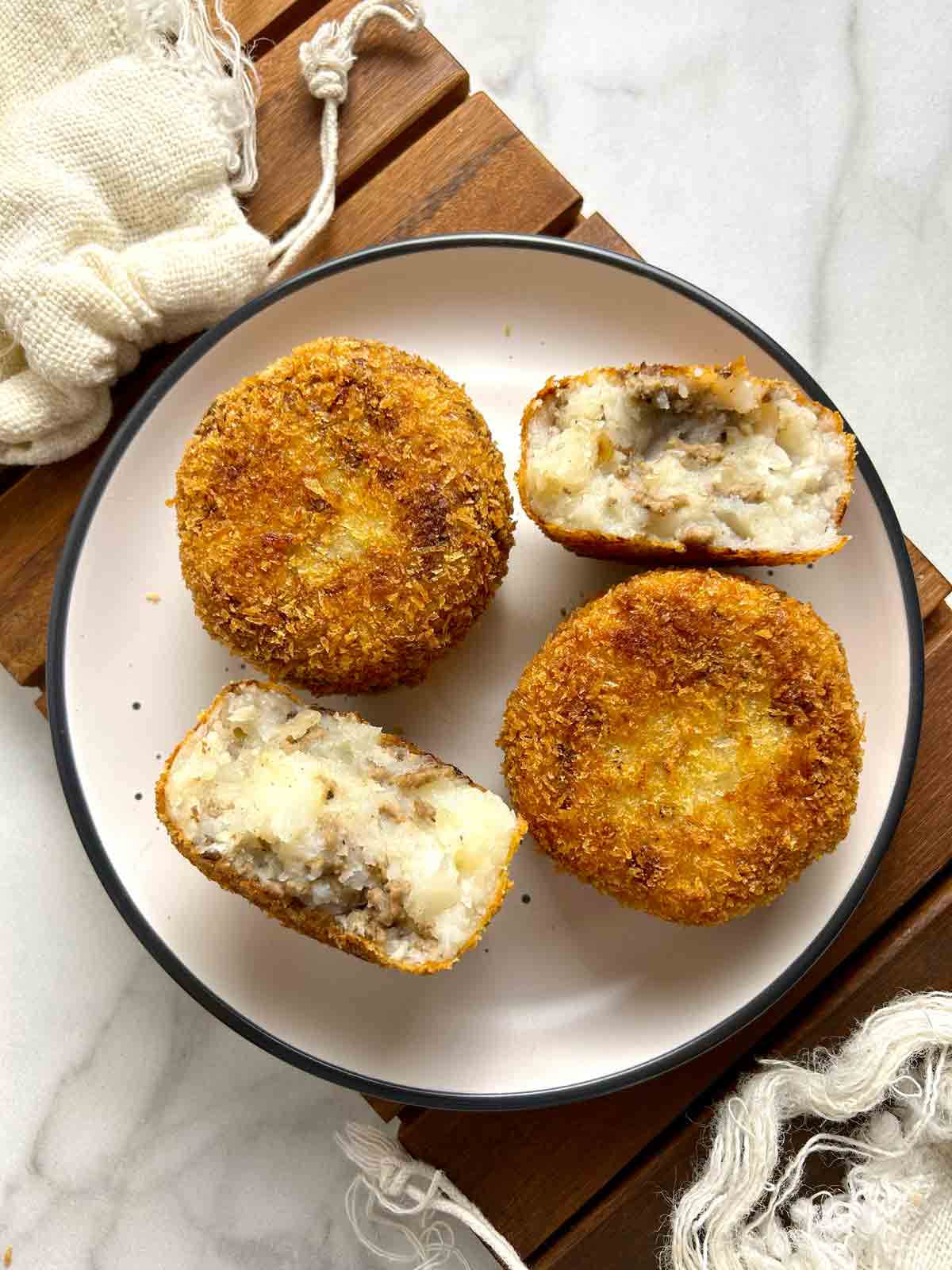 beef croquettes on plate.