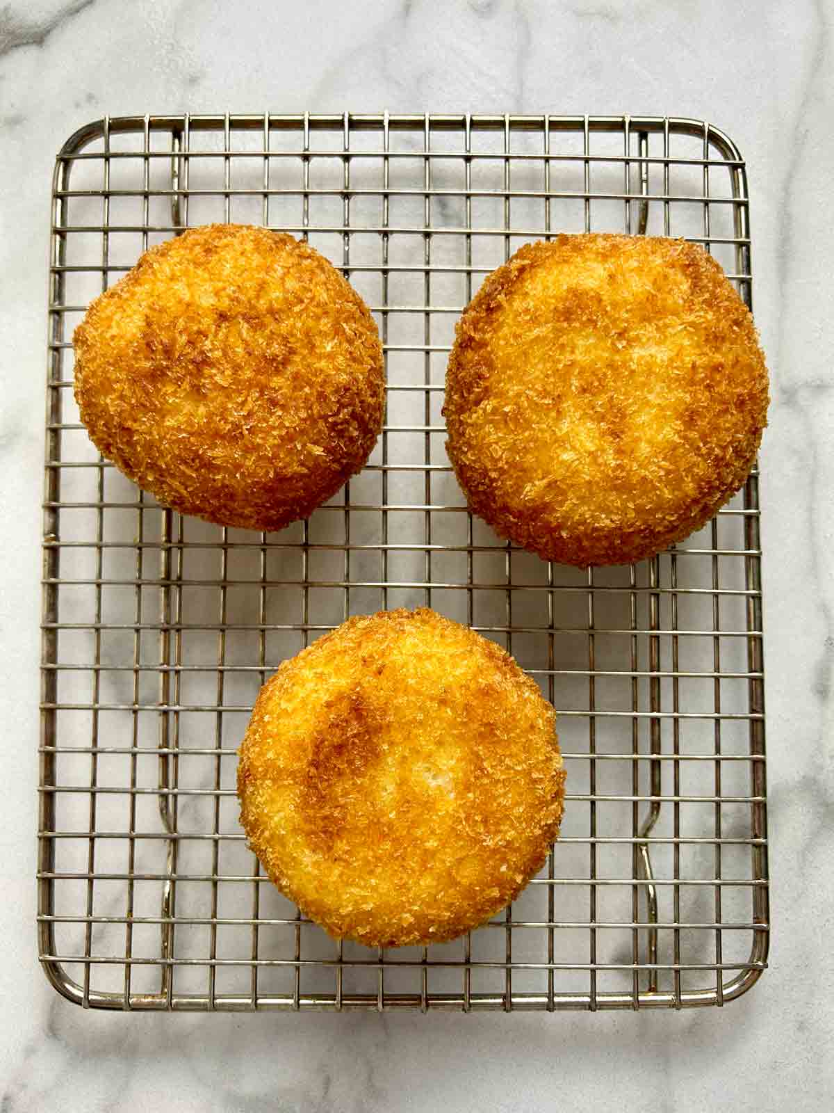 croquettes drying on wire rack.