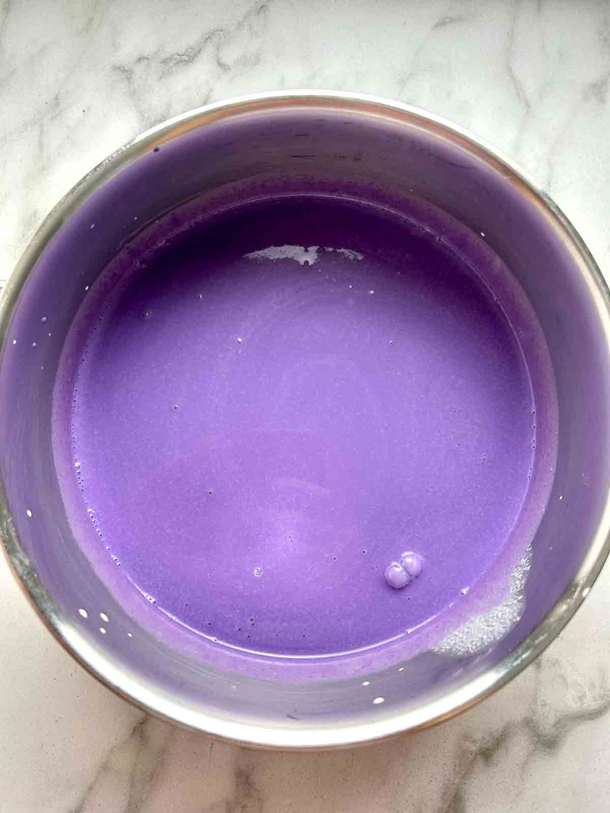 milk mixture after adding ube extract.