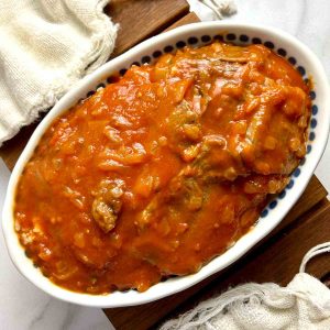 beef tongue in tomato sauce in bowl.