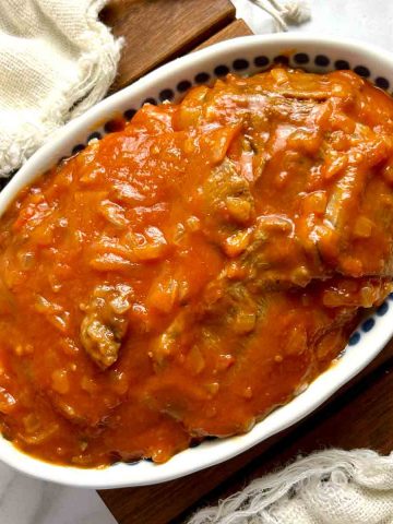 beef tongue in tomato sauce in bowl.