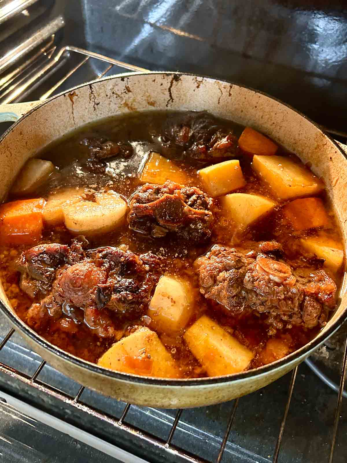 oxtail with daikon and carrots after braising for another hour.