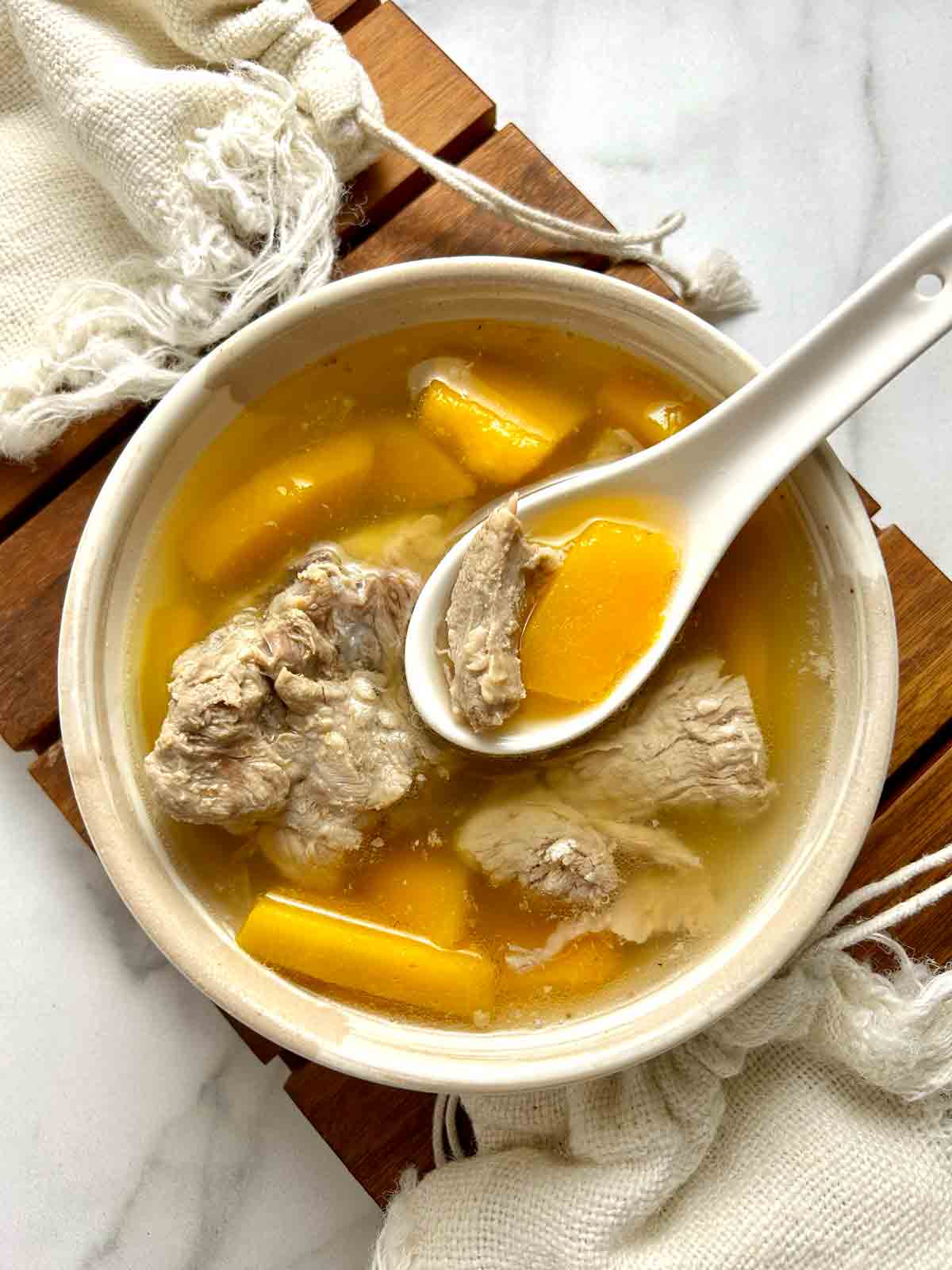 bowl of pork and pumpkin soup.