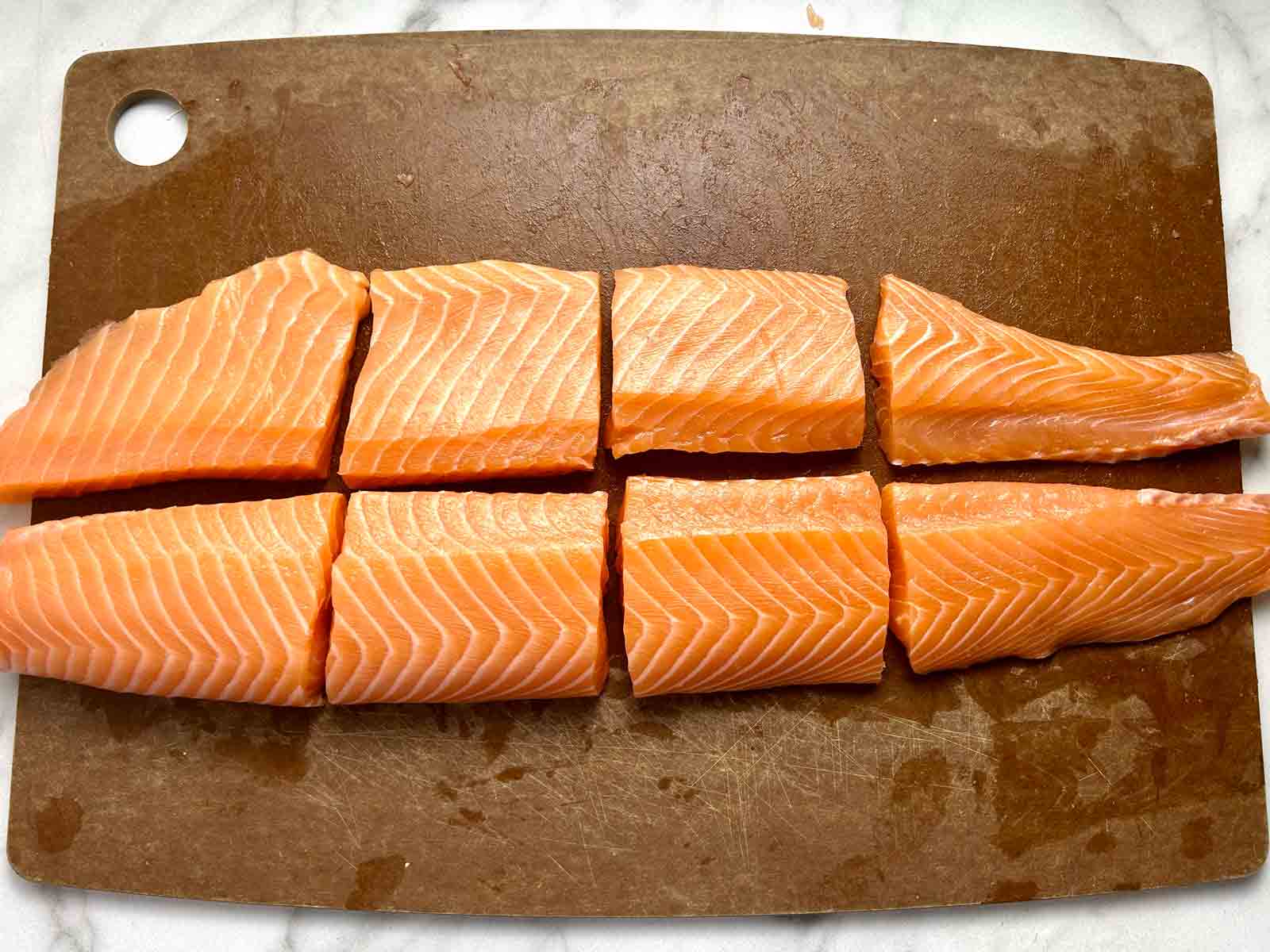 salmon fillet divided into 8 portions.