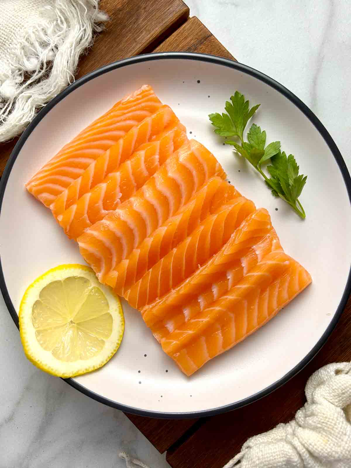 salmon sashimi on plate.