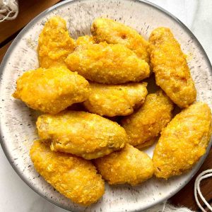 plate of salted egg chicken wings.