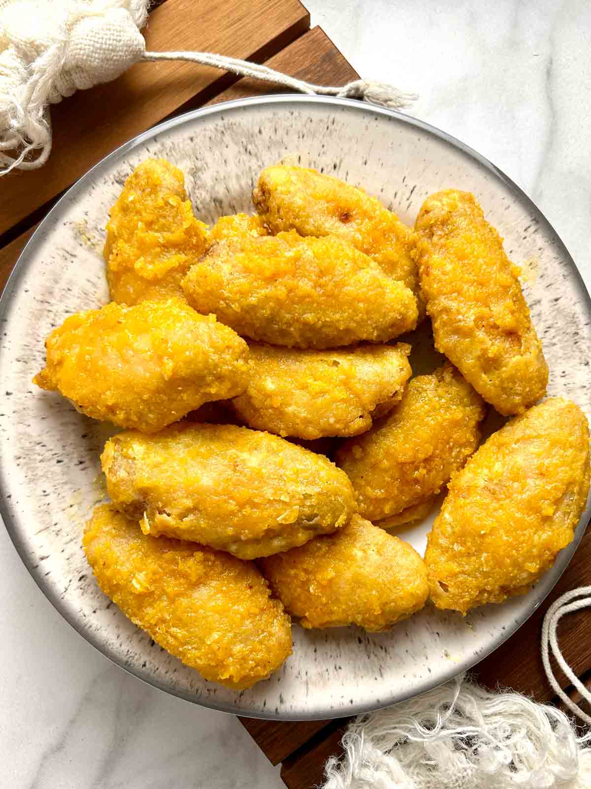 plate of salted egg chicken wings.