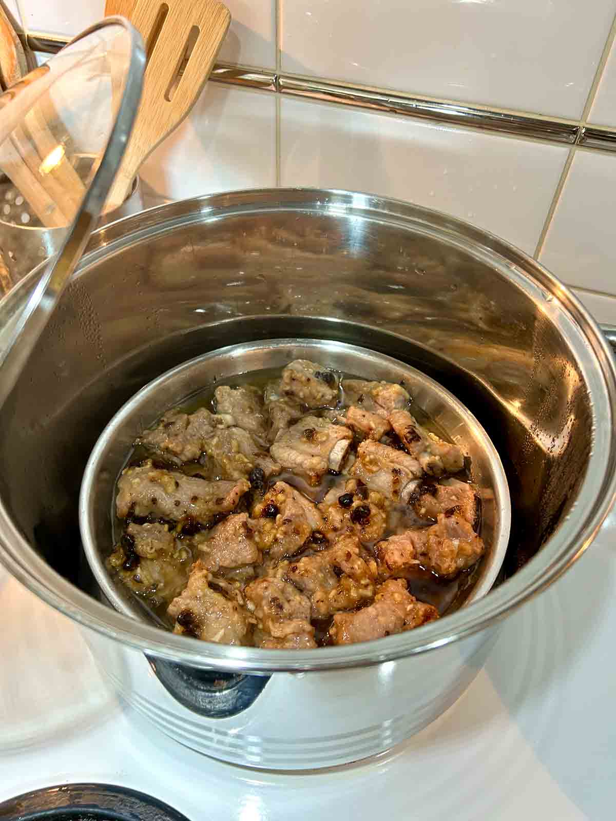 ribs being steamed in steamer.