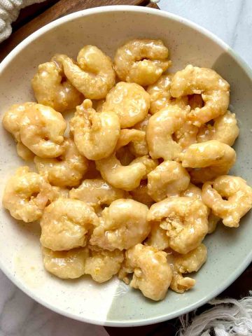 Chinese coconut shrimp on plate.