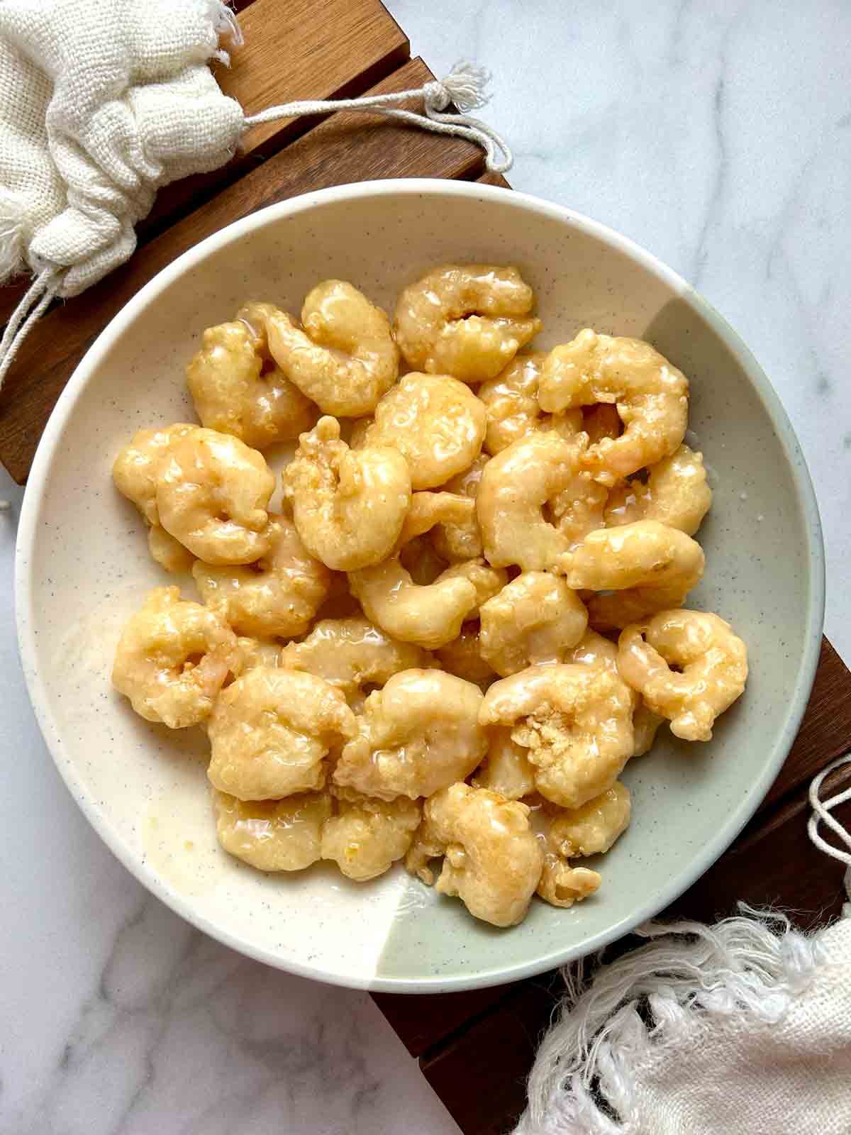 Chinese coconut shrimp on plate.