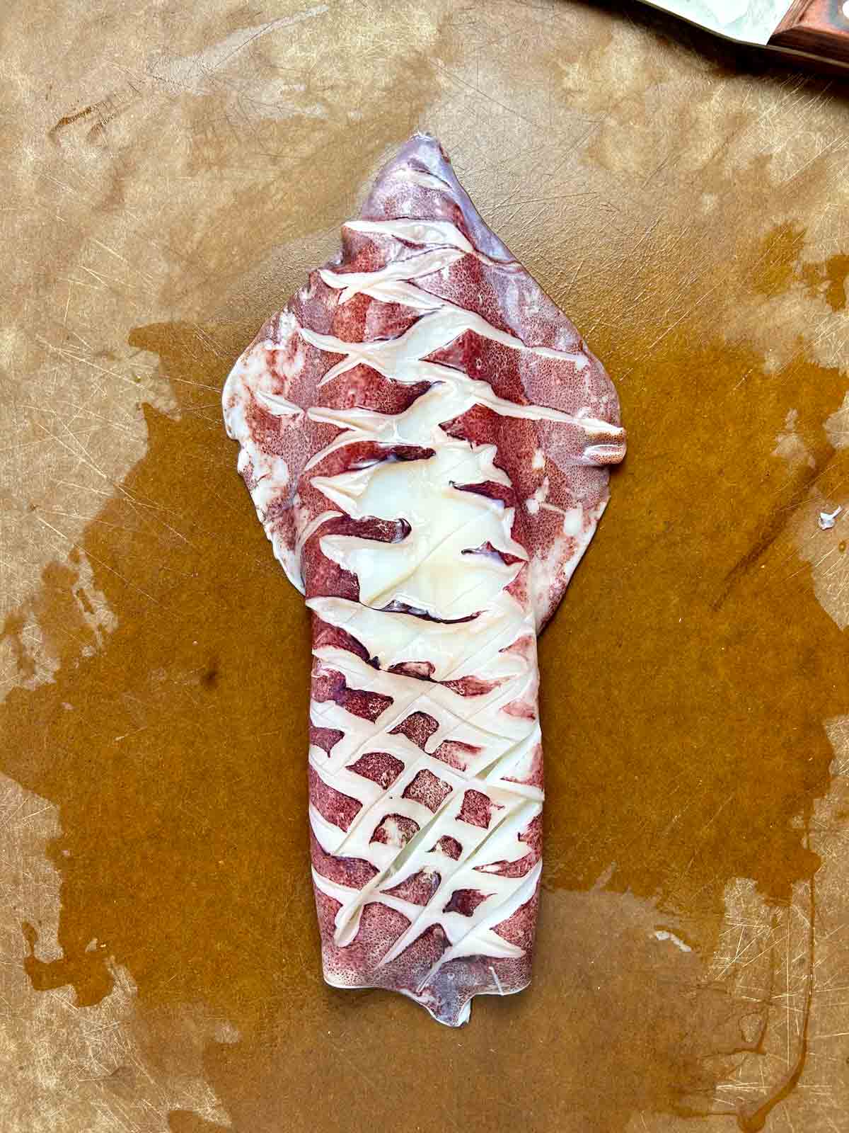 squid head with cross hatch cut into it.