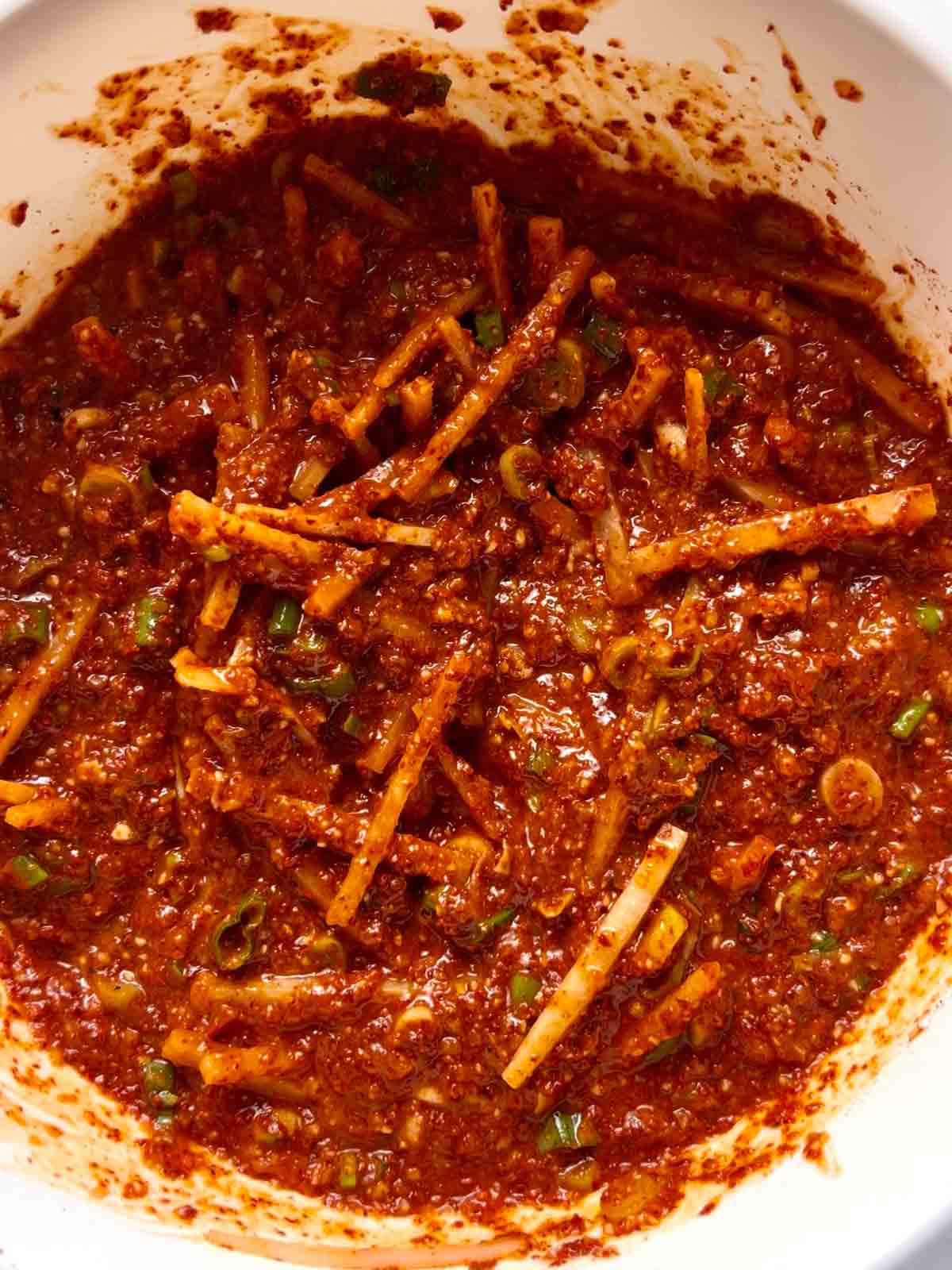 spice paste mixed with rice glue, daikon, and scallions.