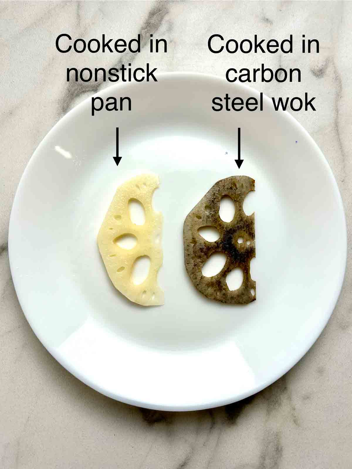 two slices of cooked lotus root showing the difference in color; one slice is pale, cooked in a Teflon pan, while the other slice is bluish-gray, cooked in a carbon steel wok.