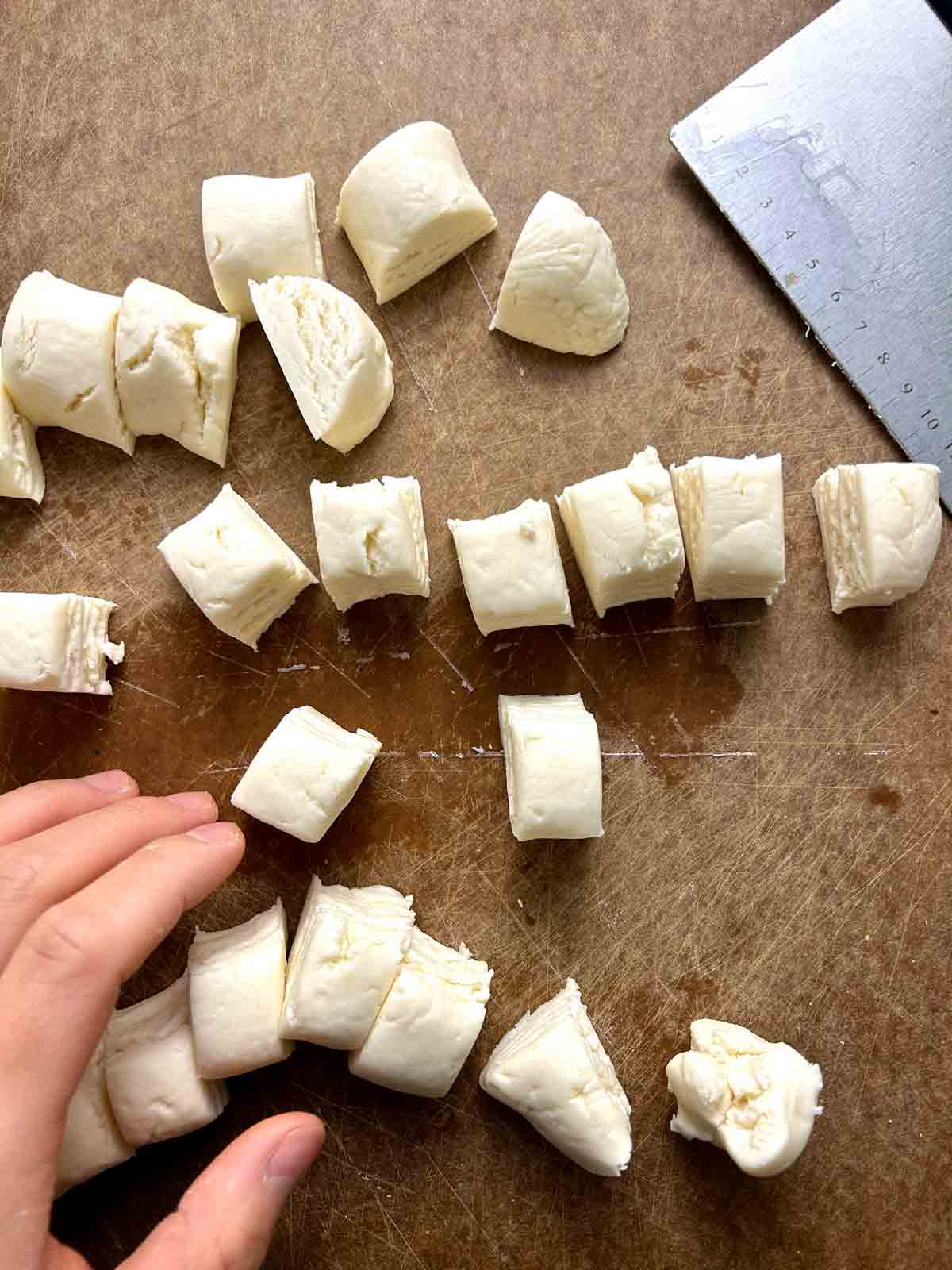 dough divided into many small pieces.