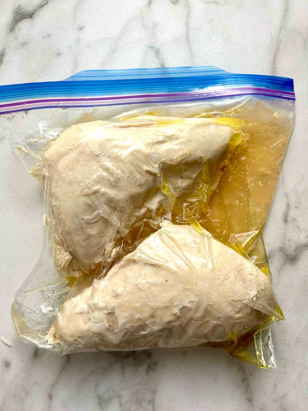 plastic bag of sous vide turkey and cooking juices.