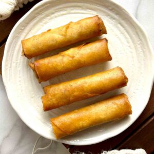 fried spring rolls on plate.