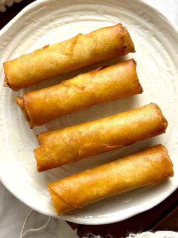 fried spring rolls on plate.