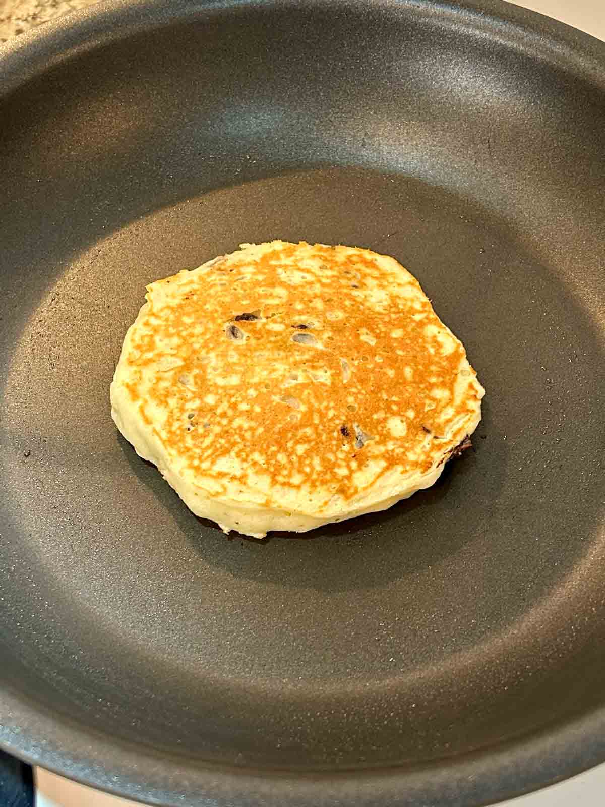 second side of pancake cooking.