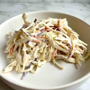 pile of coleslaw on plate.