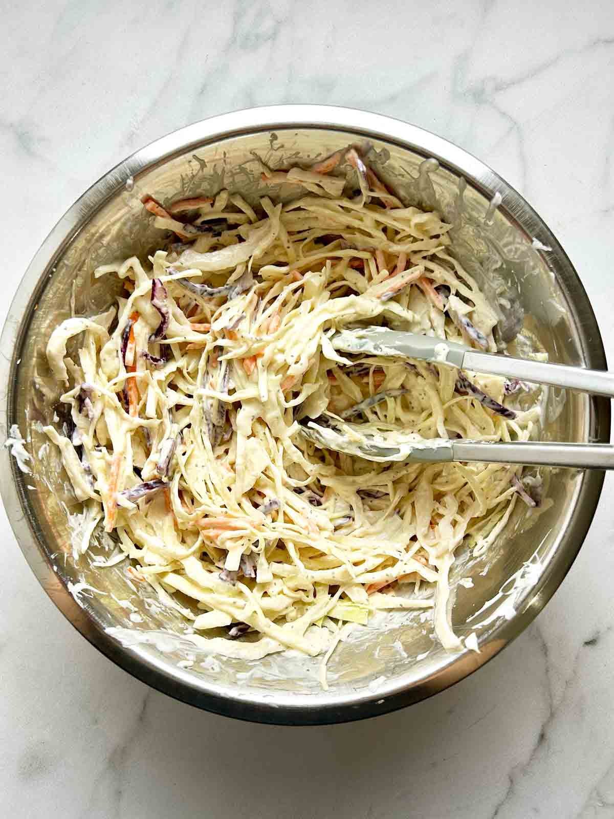 coleslaw mixed in bowl.