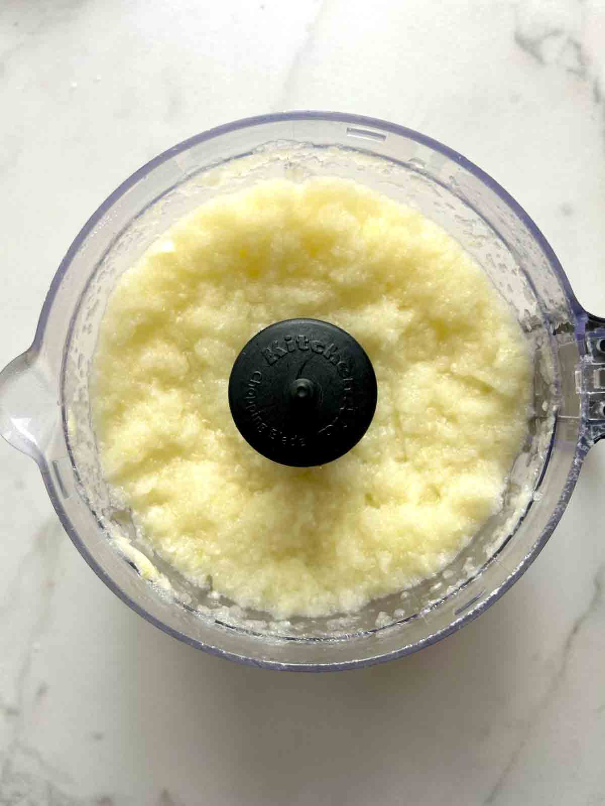 onion, pear, garlic, and ginger pureed in food processor.