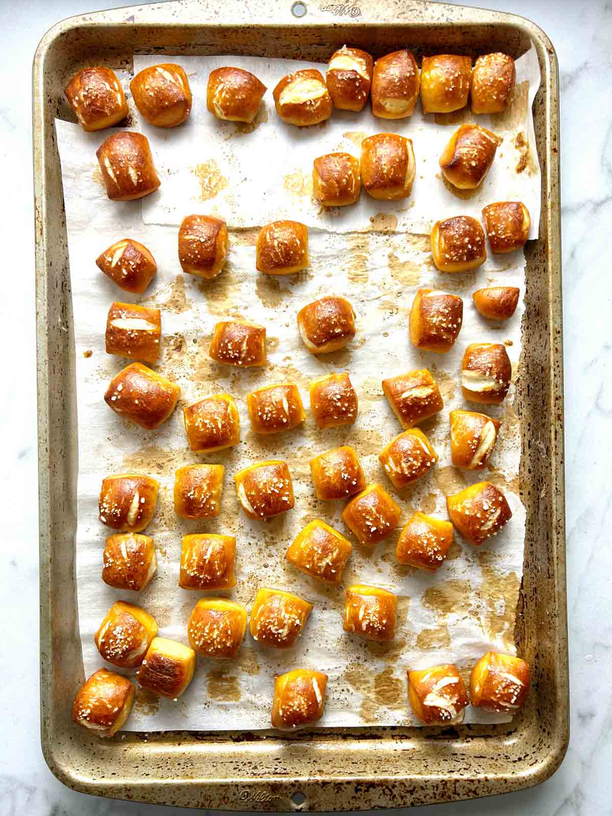 pretzel bites on baking sheet after baking.